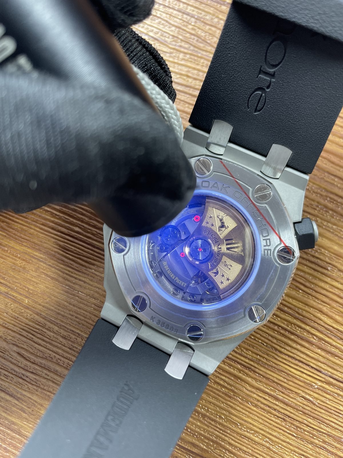 Royal Oak Offshore Diver 15710ST replica exhibition back under blue light caseback marking K33803