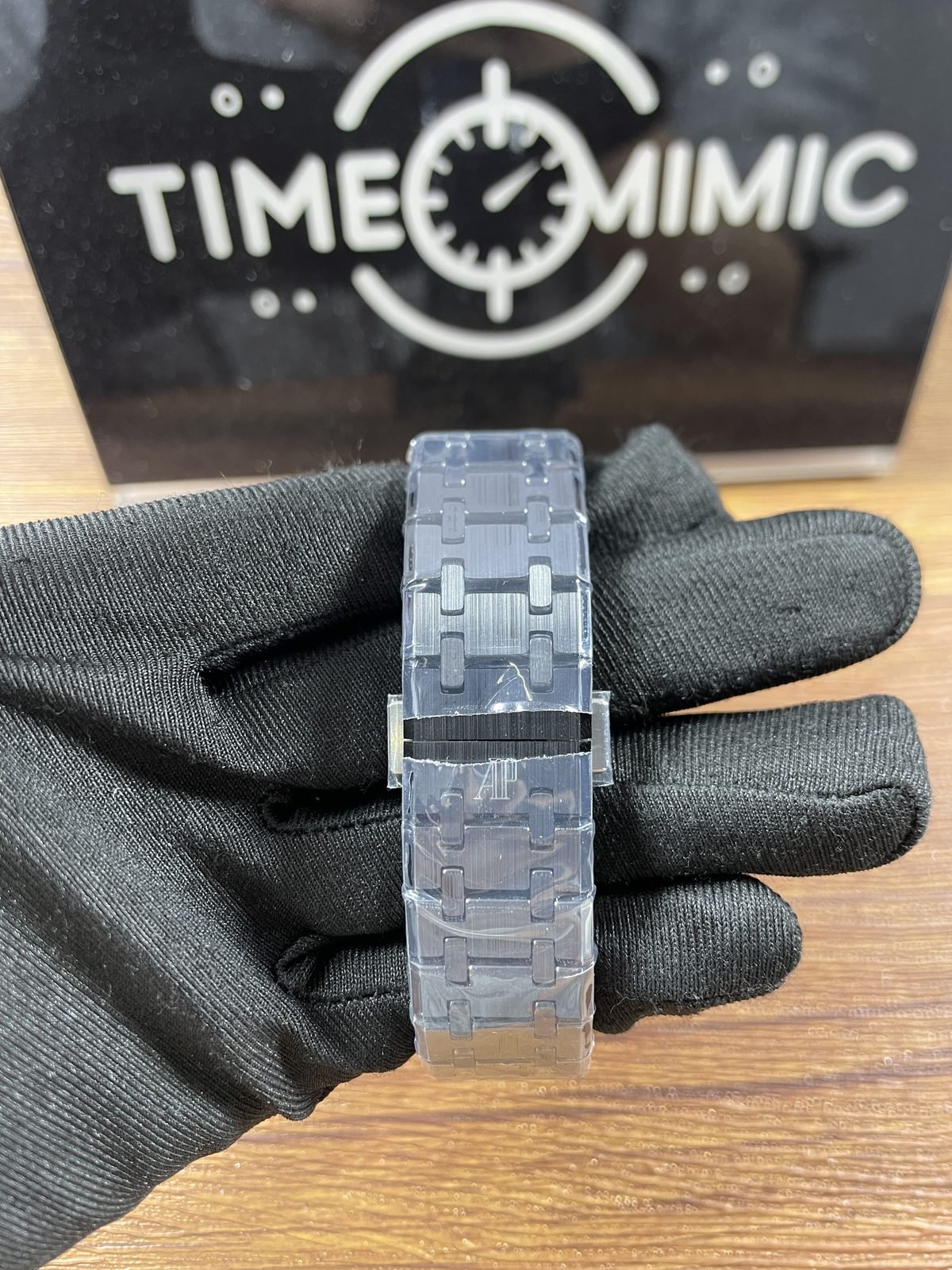Royal Oak 26240CE replica protected dark-tone integrated bracelet AP-style folding clasp