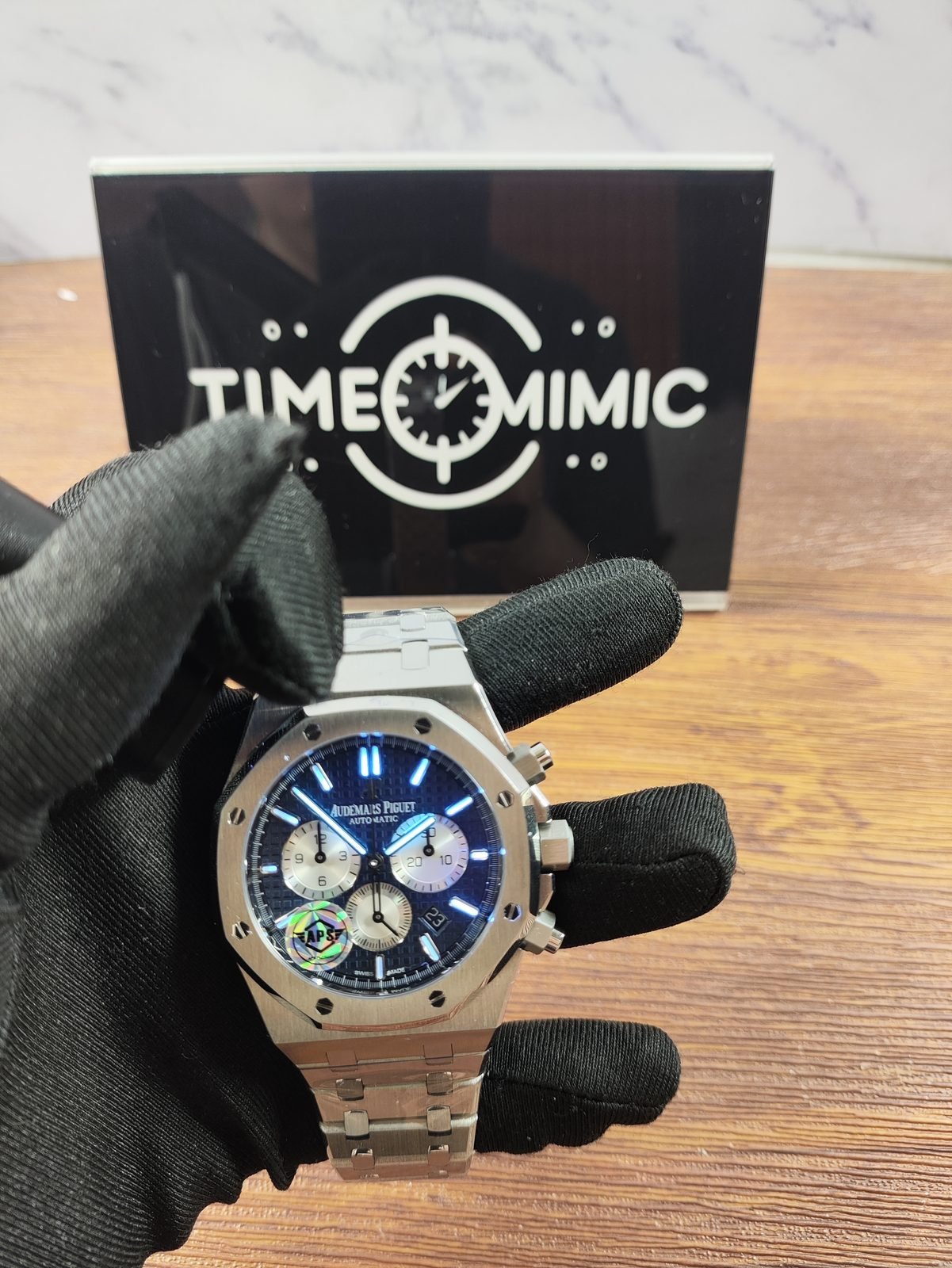 Royal Oak 26331ST replica hands and markers under blue UV-style light