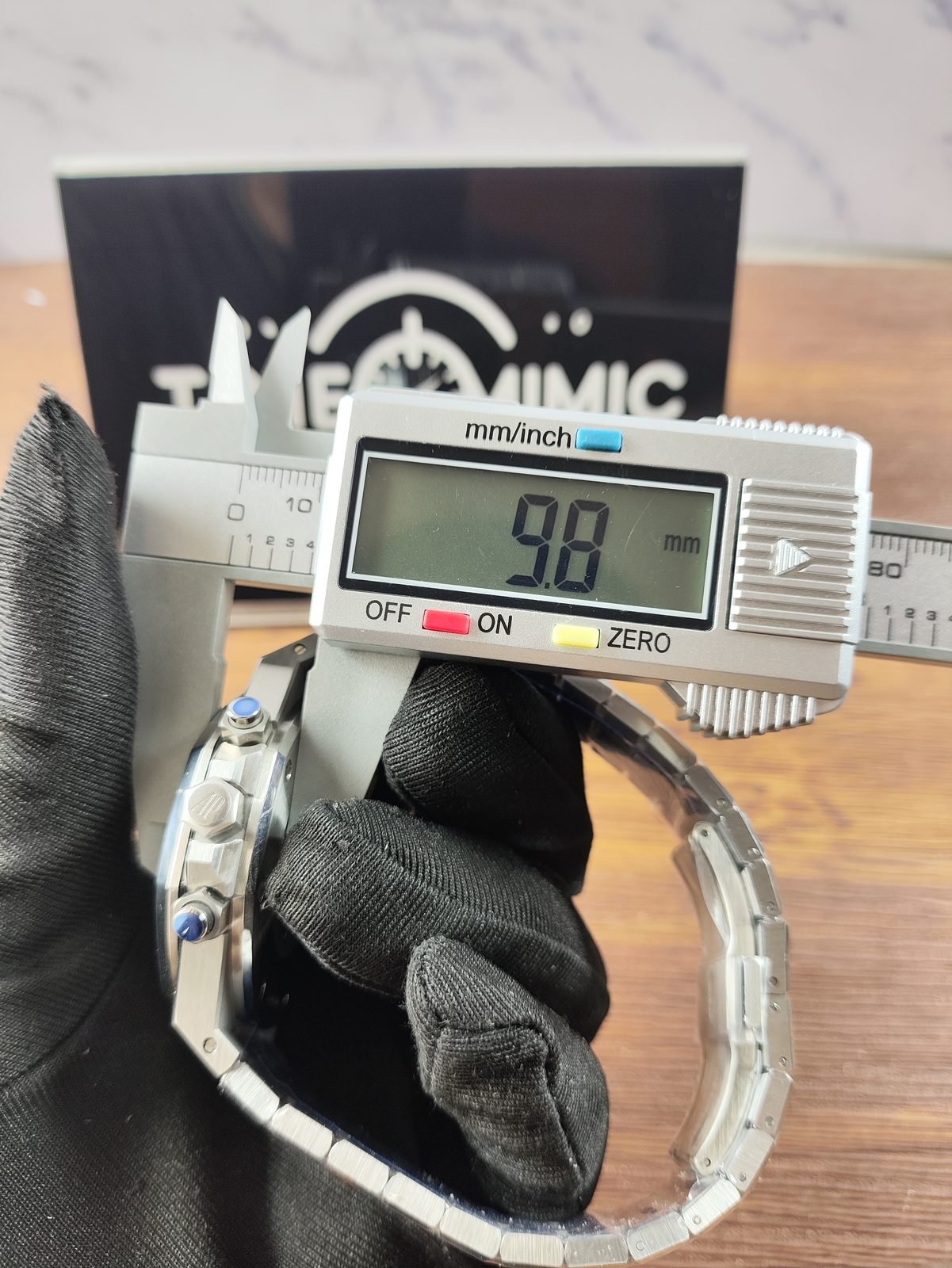 Royal Oak 26331ST replica pictured thickness calliper reading about 9.8 millimetres