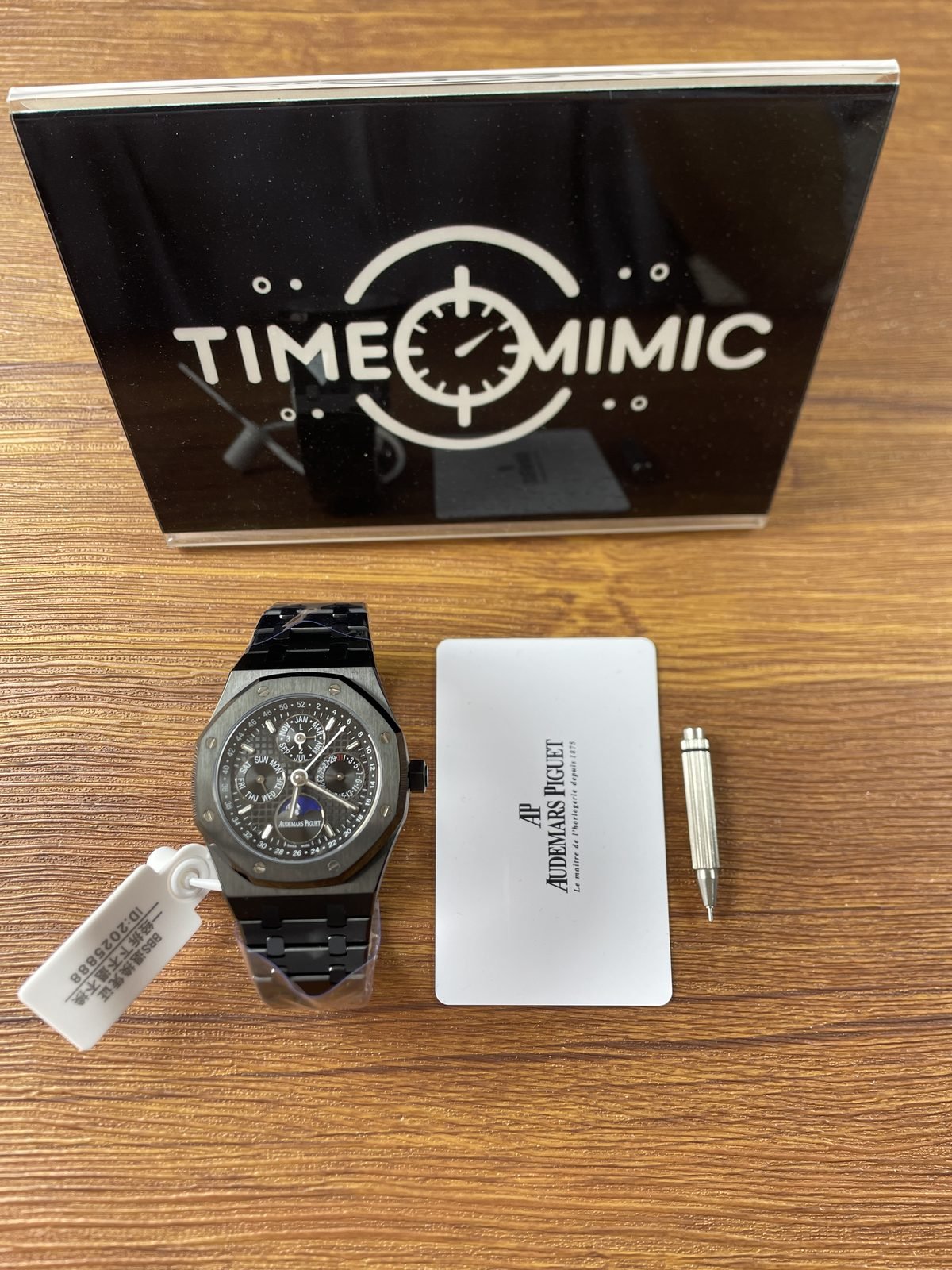 Royal Oak 26574 family perpetual calendar replica dark integrated bracelet table set with card pusher tool and tag