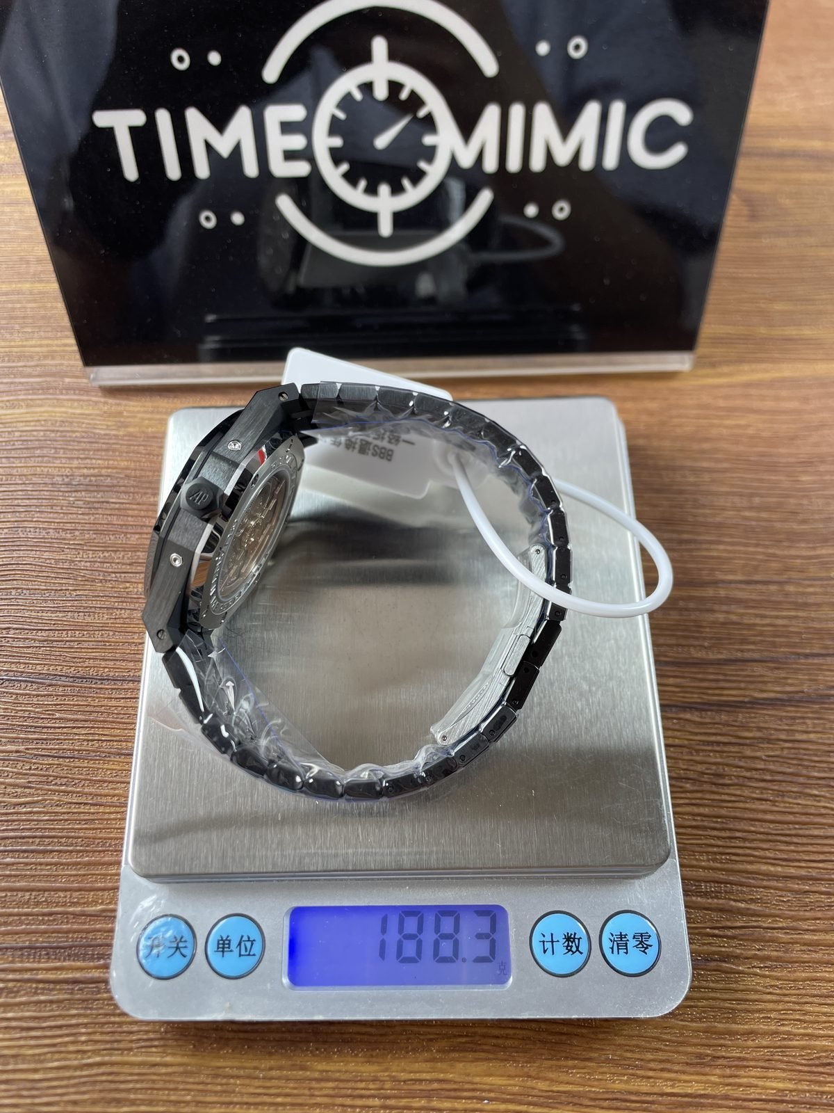 Royal Oak 26574 family replica protected dark bracelet scale reading 188.3 grams with security cable