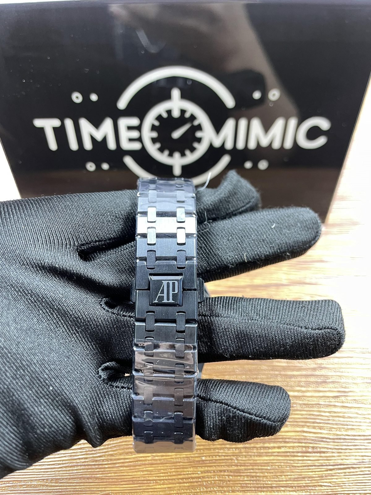 Royal Oak 77350CE replica listing sample dark integrated bracelet and AP-style clasp exterior