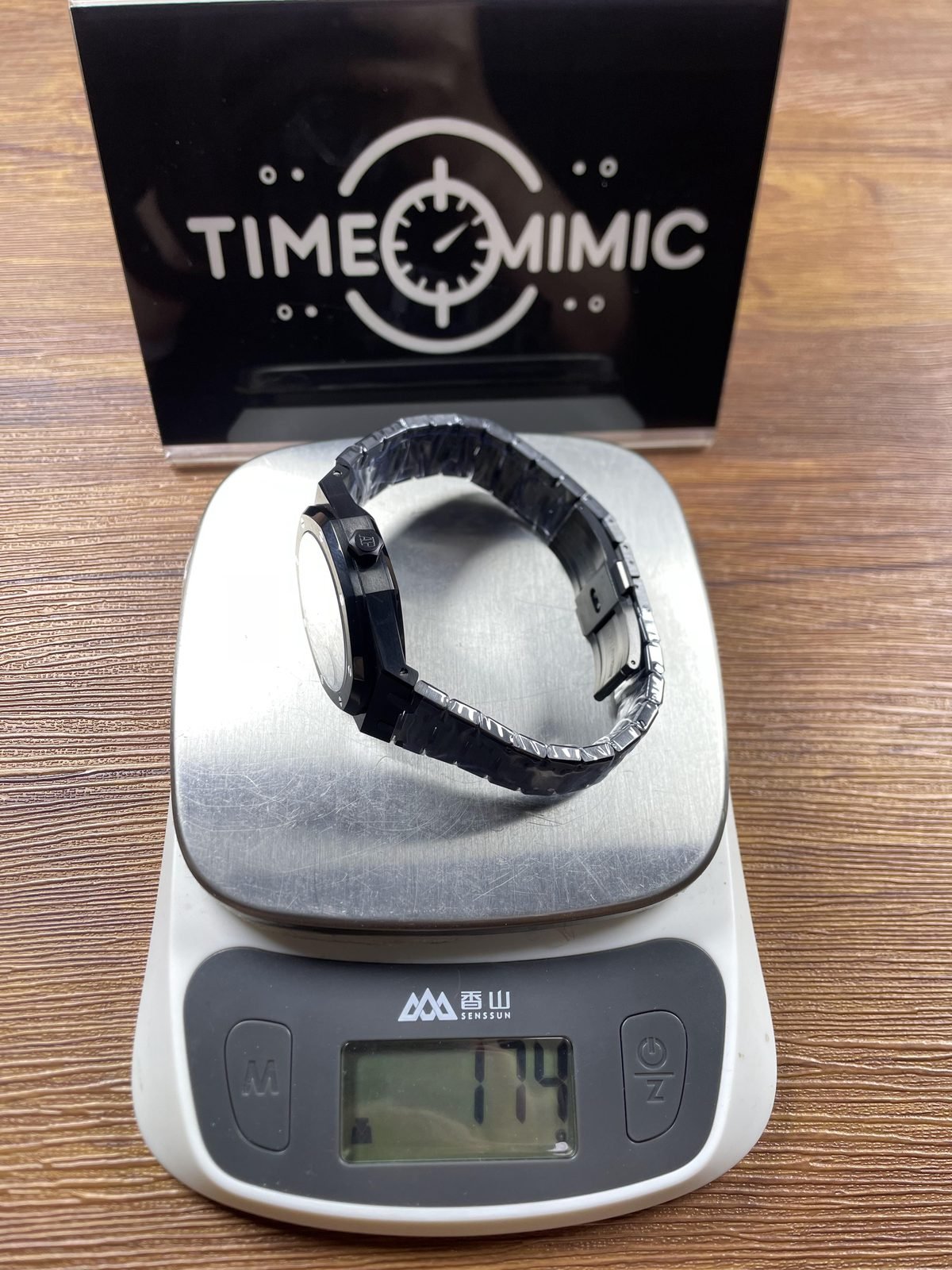 Royal Oak 77350CE replica listing sample scale reading 174 grams with film and pictured bracelet links