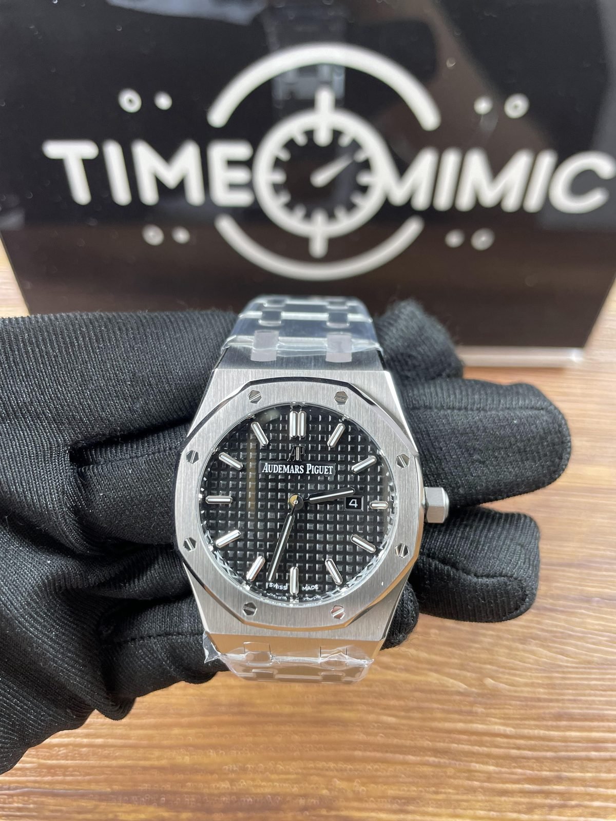 Royal Oak custom replica archive configuration A black square-pattern dial date four and steel-tone integrated bracelet