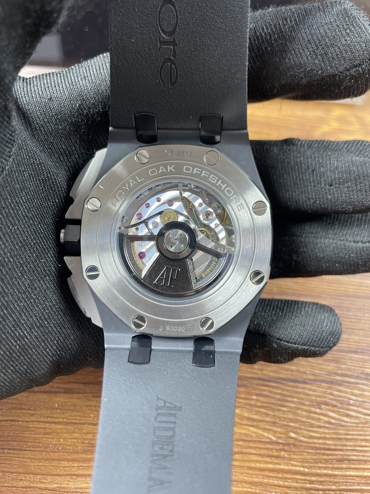 Royal Oak Offshore 26402CE replica exhibition back decorated automatic-looking movement N3025-style and J30030-style marks
