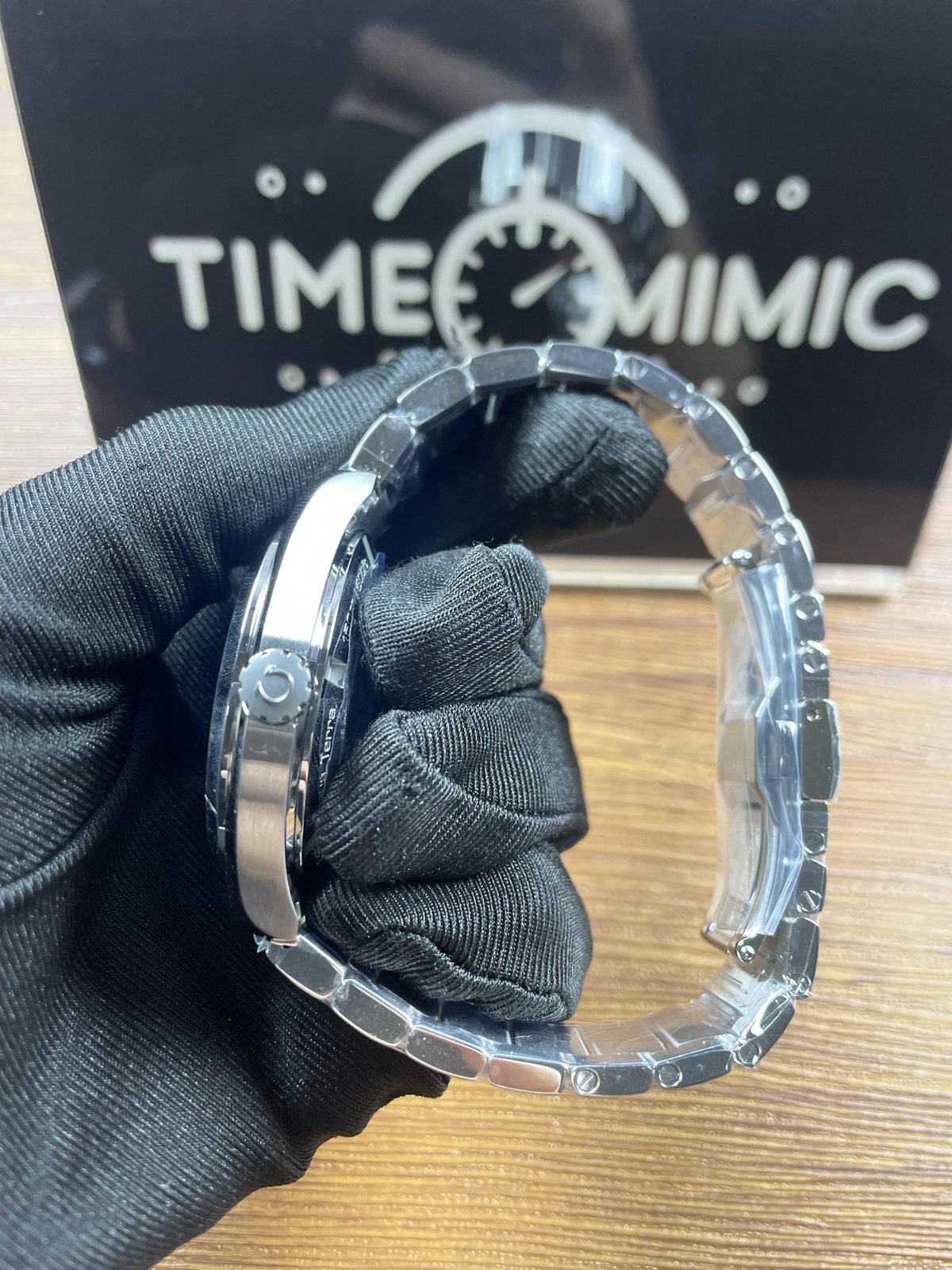 Aqua Terra style sample crown side steel tone case and protected bracelet profile