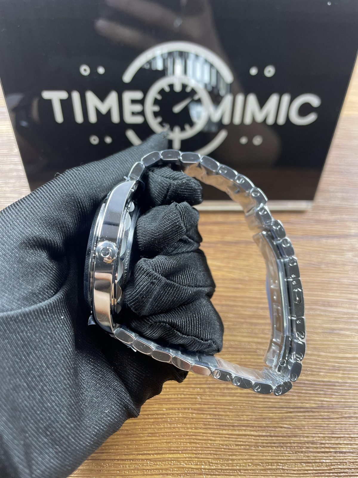 Aqua Terra style sample crown side steel tone case and protected bracelet profile