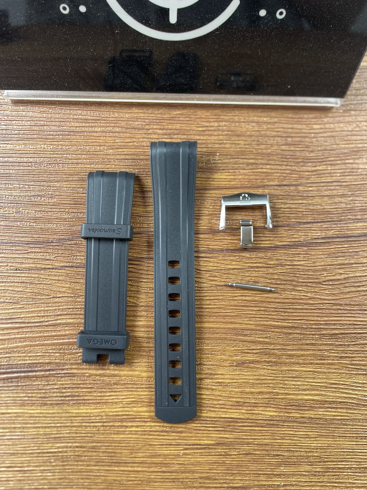 Black rubber style strap halves pin buckle and spring bar