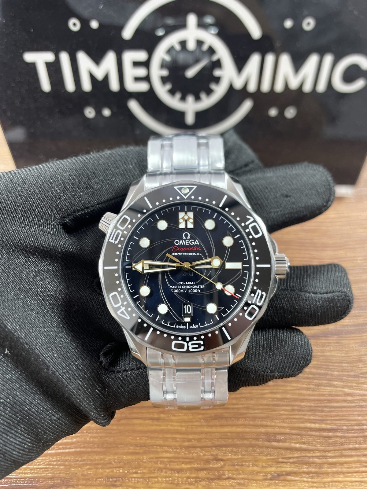 Omega Seamaster 007 replica black gun barrel style dial and steel bracelet front