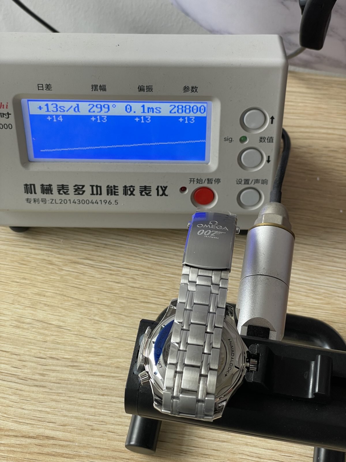 Timegrapher screen reading plus 13 seconds per day 299 degrees 0.1 milliseconds and 28800
