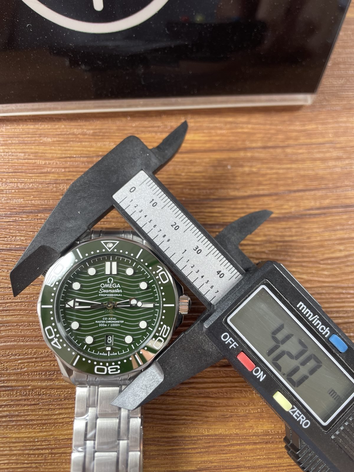 Digital calliper showing about 42.0 millimetres across the photographed watch span