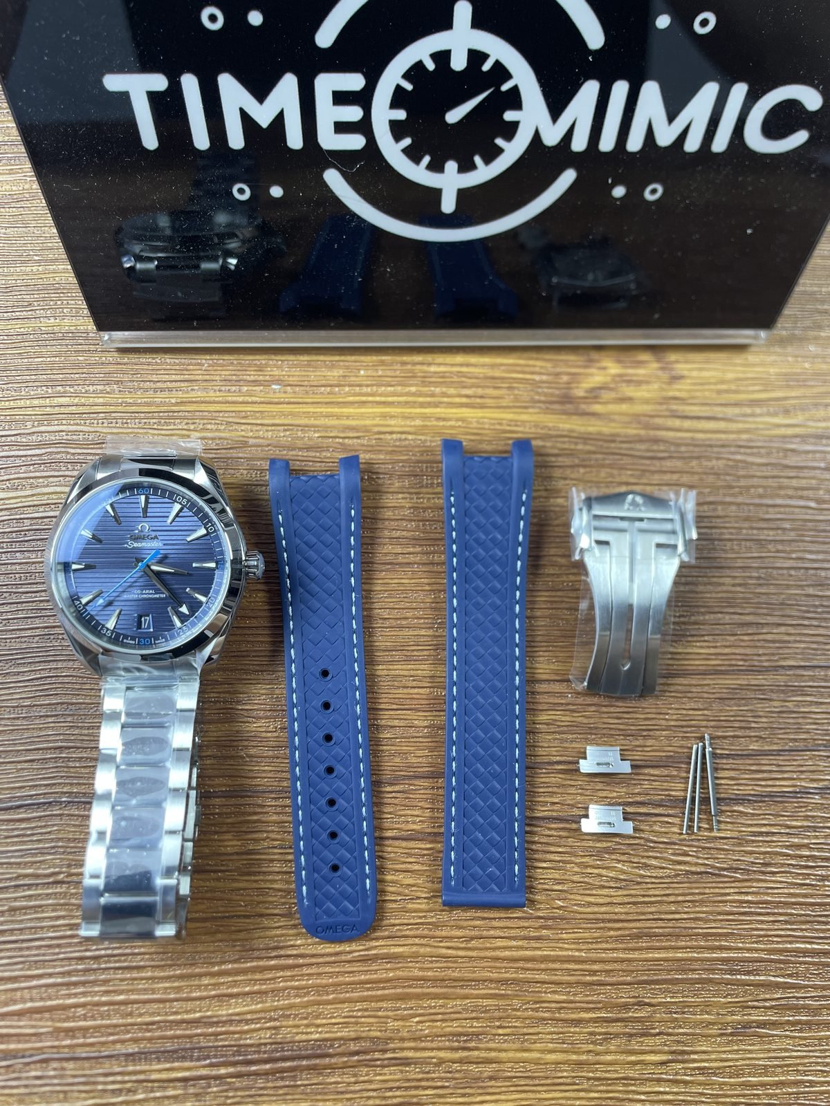 Blue horizontal stripe Aqua Terra replica with steel tone bracelet loose blue stitched strap clasp connector and pin like parts