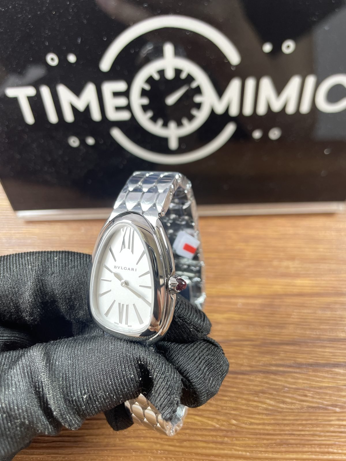 Bvlgari Serpenti 103141 replica silver white dial drop-shaped case angled crown view