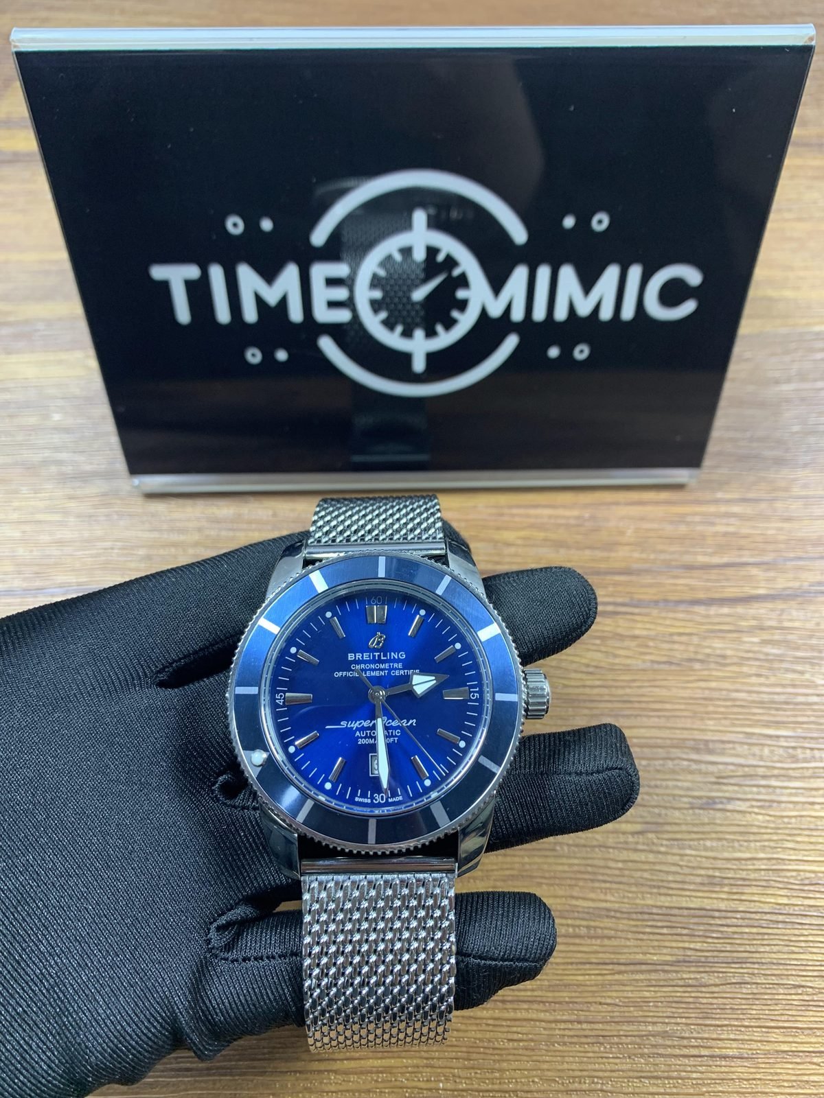 Breitling Superocean custom replica blue dial blue bezel steel tone mesh bracelet front