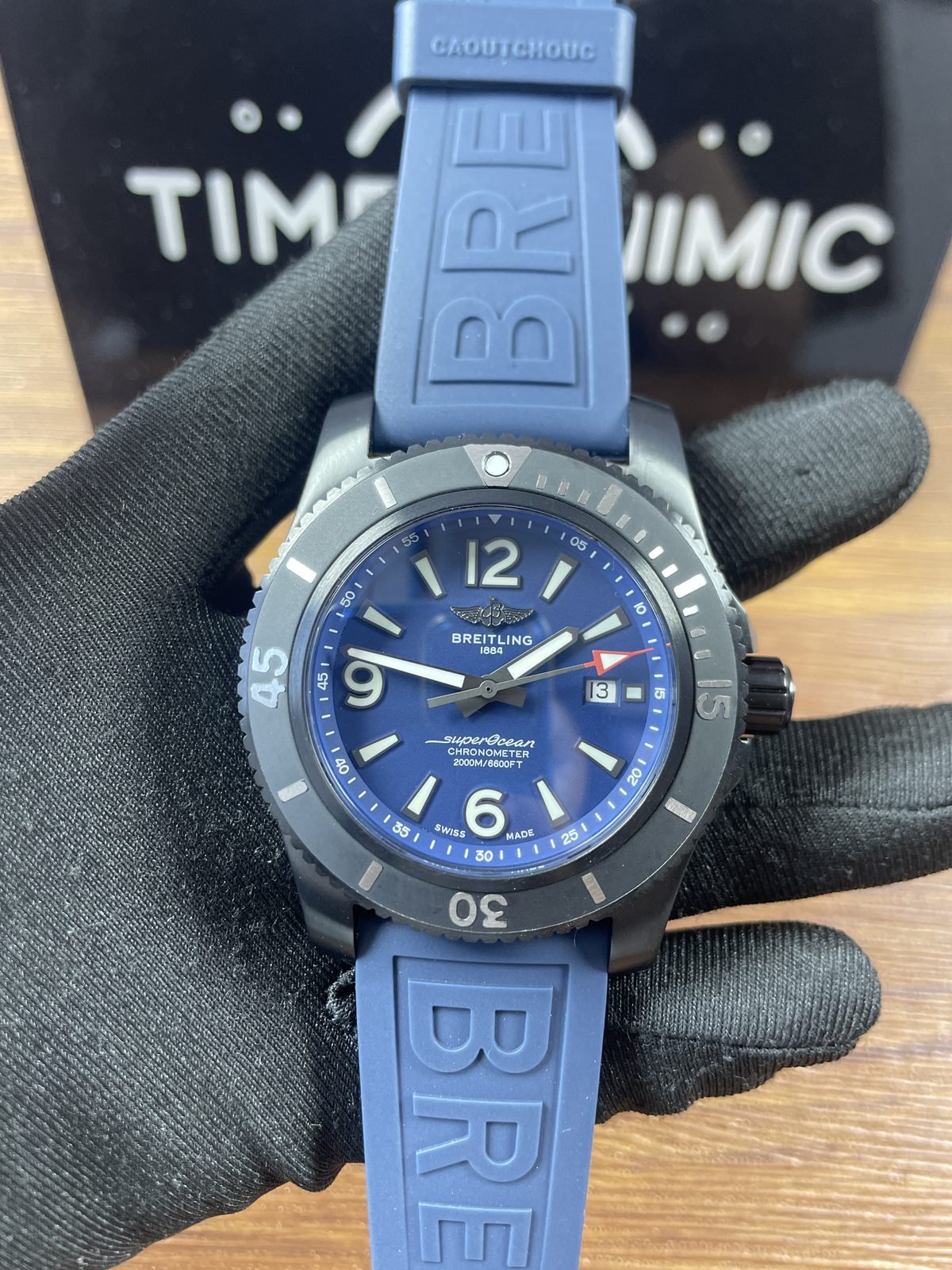 Breitling Superocean M17368D71C1S2 replica blue dial dark case blue rubber strap front