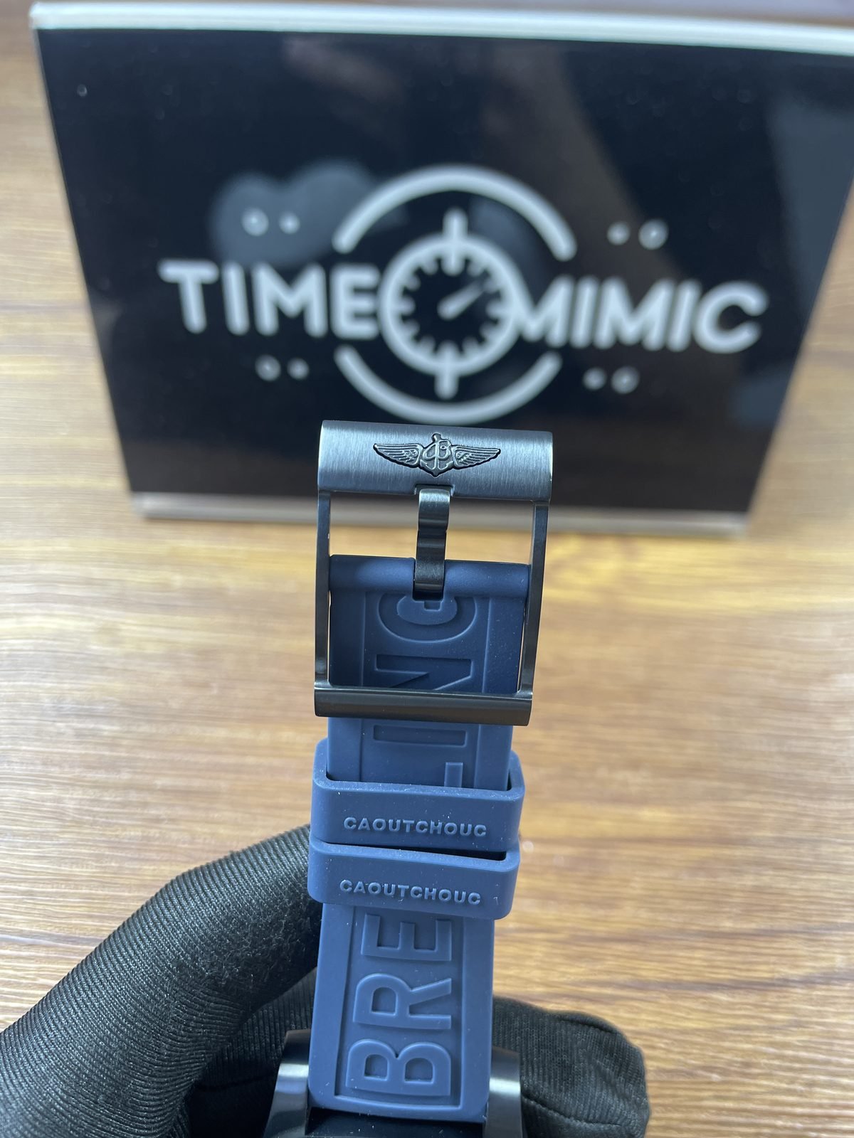 Breitling Superocean M17368D71C1S2 replica pictured dark pin buckle blue rubber keepers