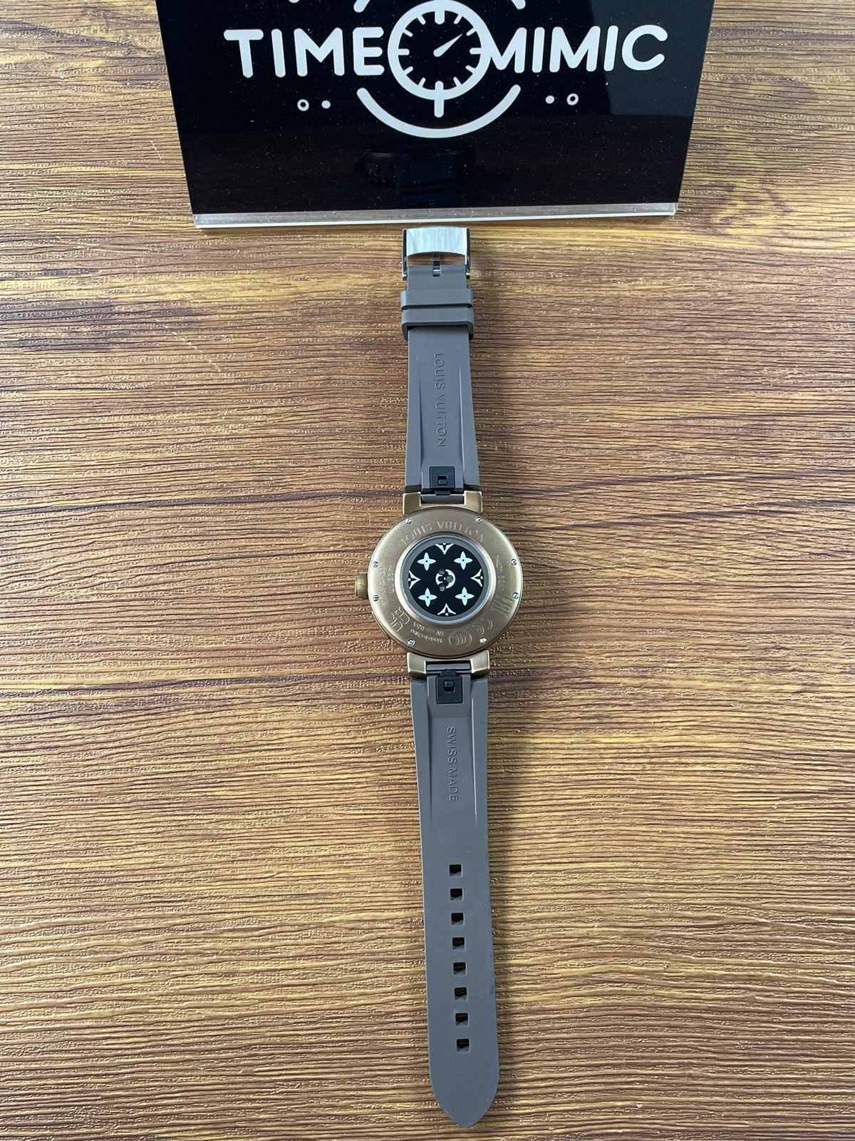 Louis Vuitton Tambour Horizon N1 replica round marked caseback central black monogram area and strap underside
